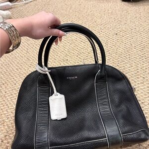 COACH Black Pebbled Leather Satchel with White Luggage Tag